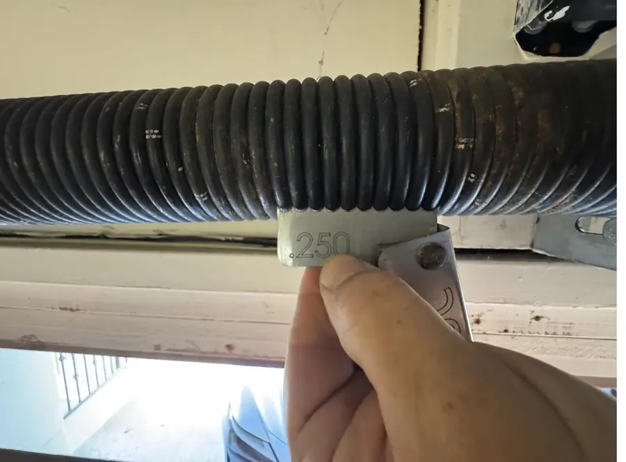 Measuring the wire size of a torsion spring before ordering a replacement
